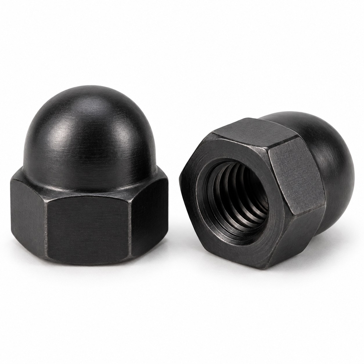 Nakrętki kołpakowe DIN 1587 A4 Black Oxide — ilustracja